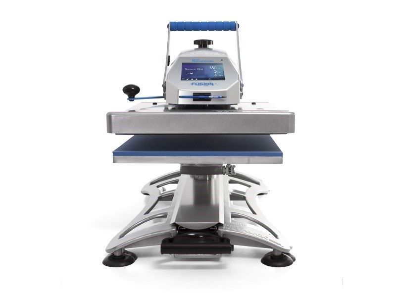 A machine is sitting on top of a table on a white background.