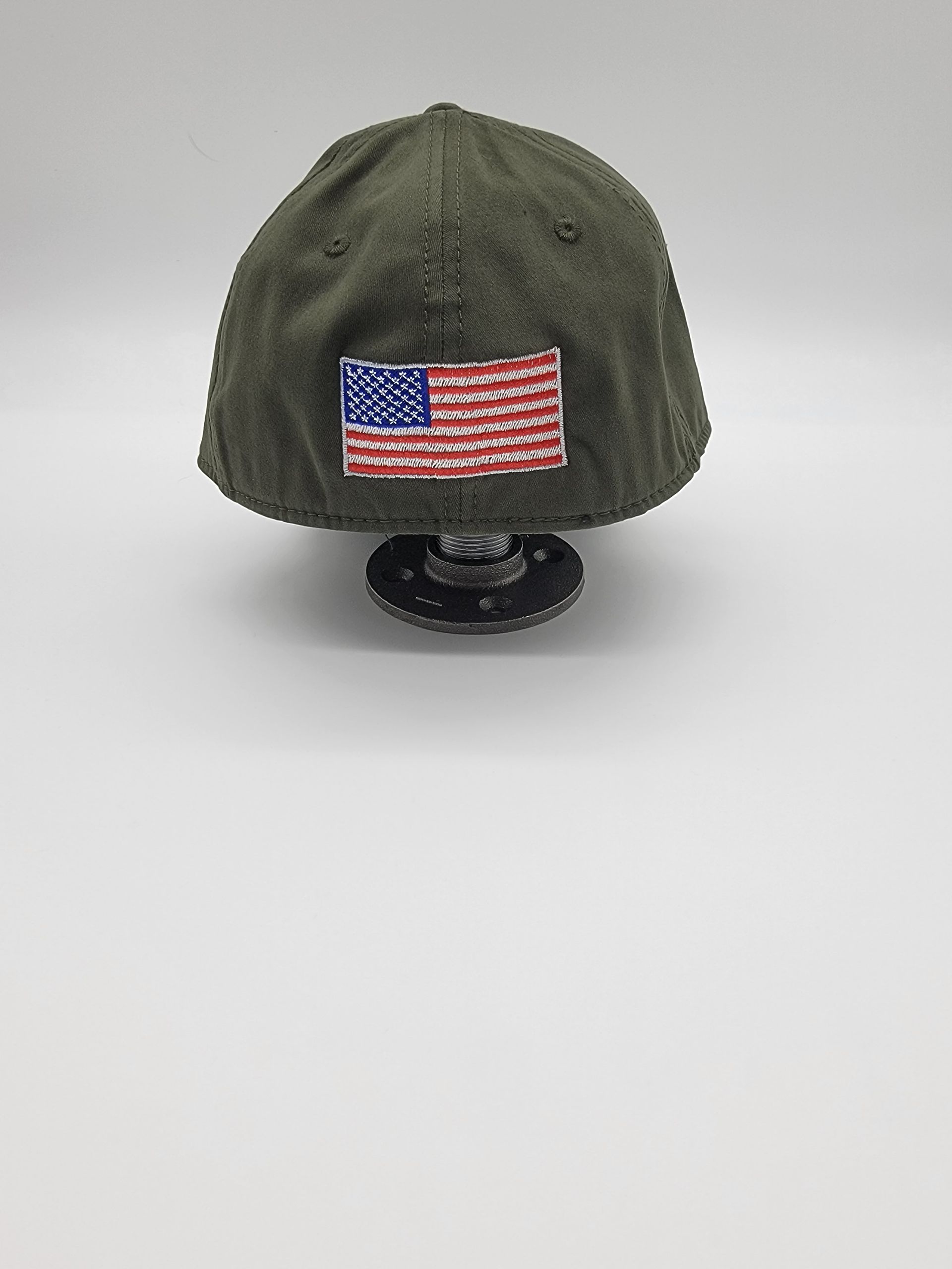 A baseball cap that says vietnam veteran on it