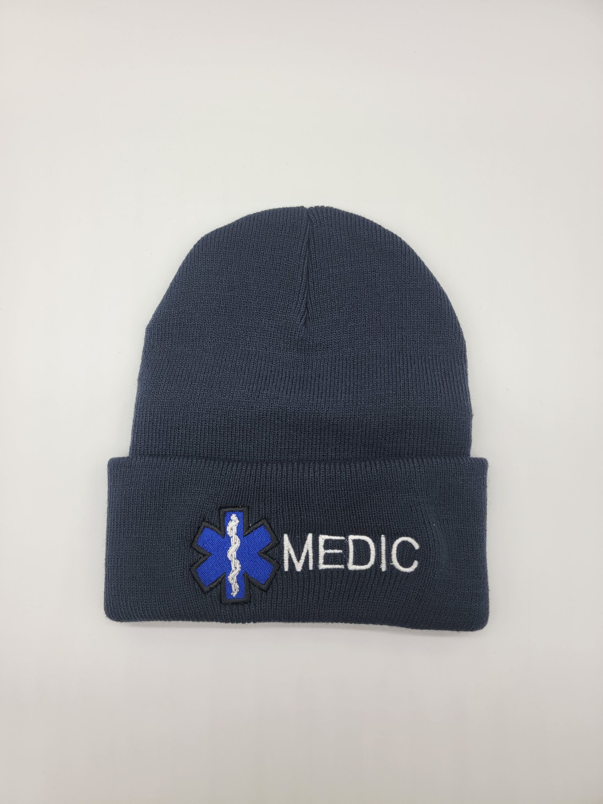 A black beanie with a blue star of life embroidered on it.