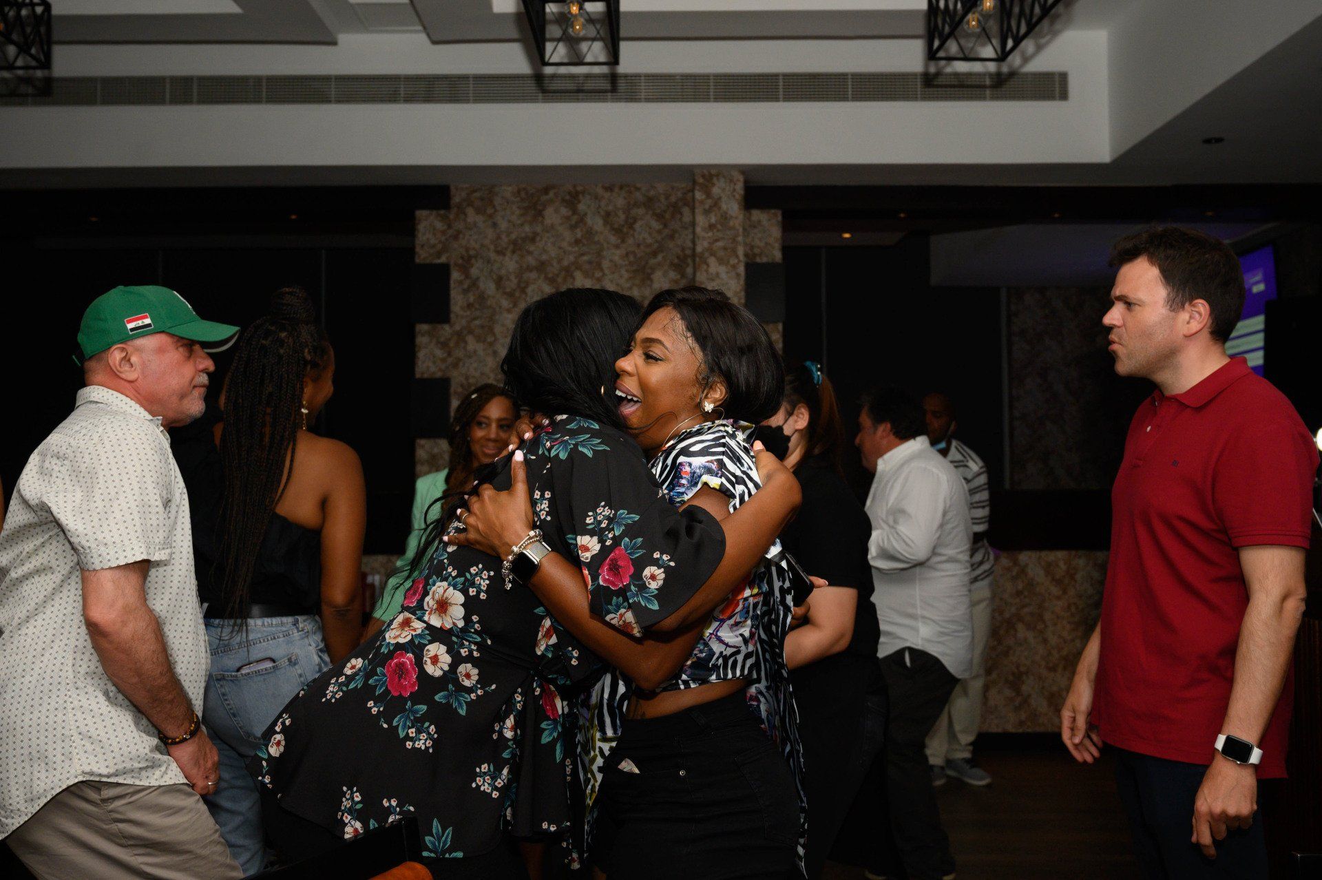 Stephanie LaPierre (CEO) hugging a woman at a party
