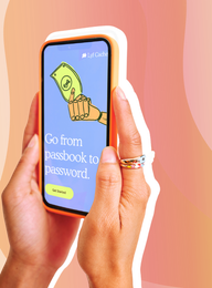 A person is holding a cell phone that says go from passbook to password
