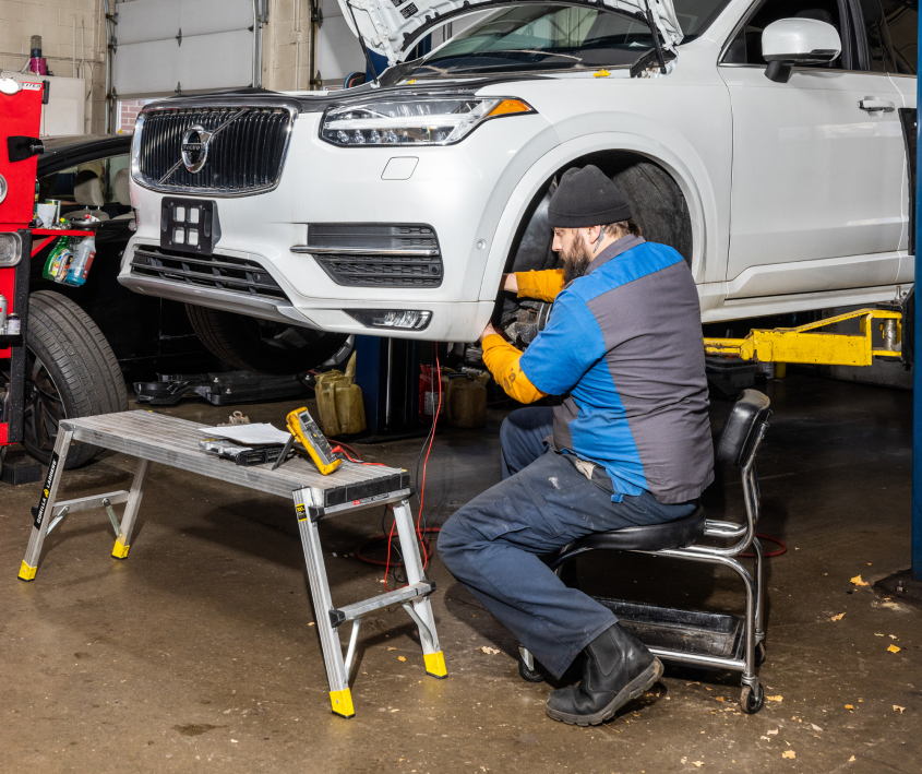 Mechanic Working on Car | Auto Evaluators