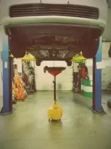 A Vehicle is on a Lift in Auto Evaluators