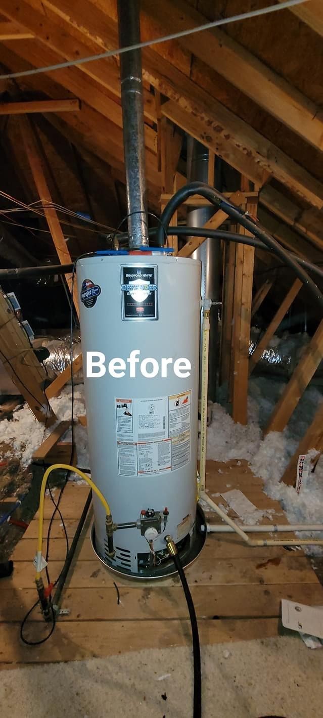 A water heater is sitting in the attic of a house.