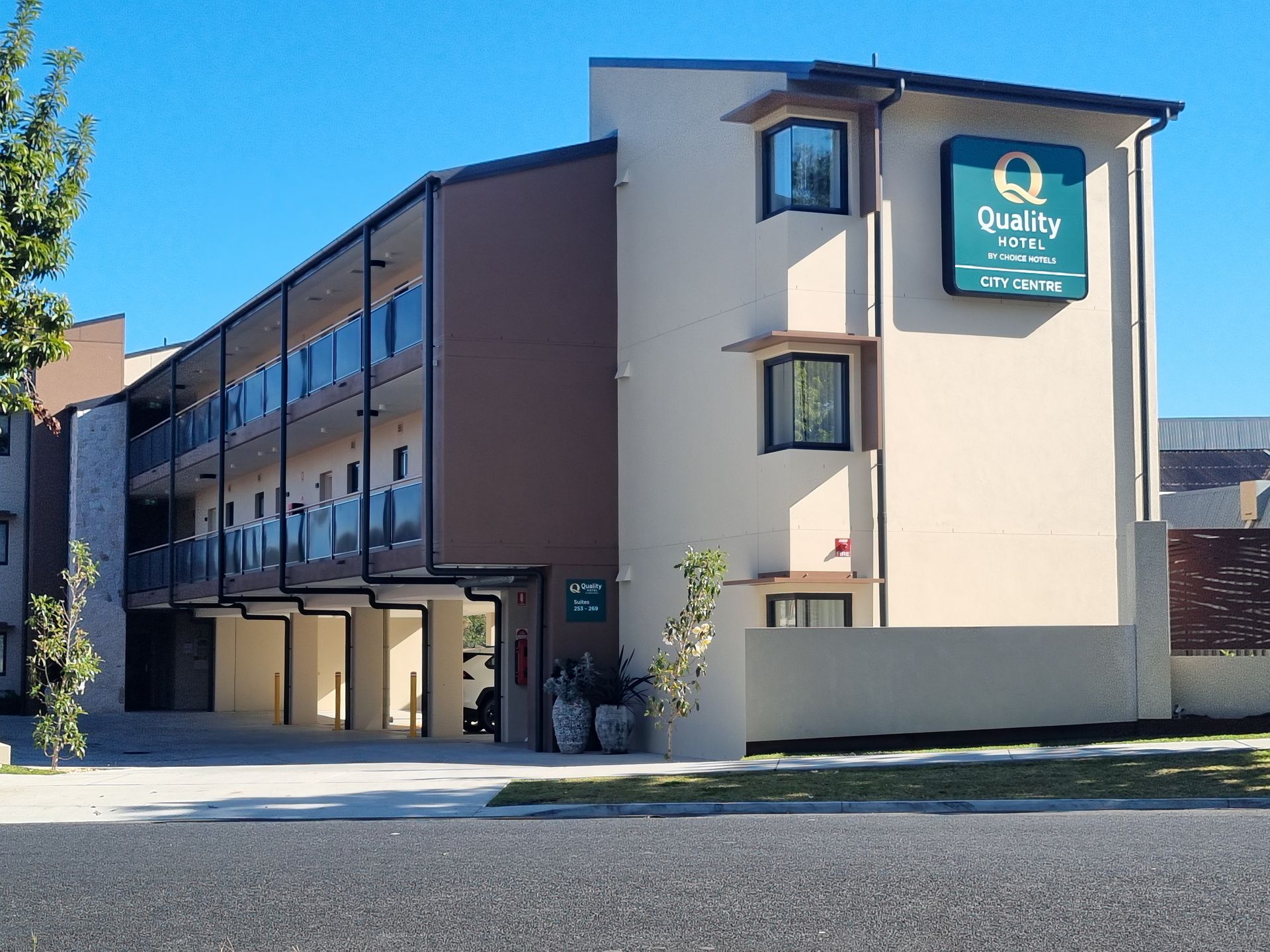 Quality Hotel, Tan Building With Balconies — Acheson Building Certification in Nambucca Heads, NSW