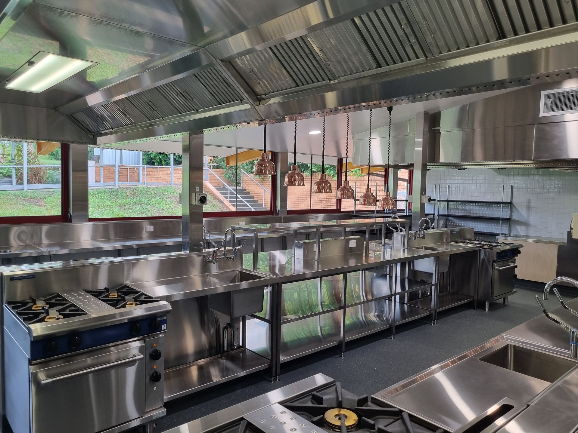 Commercial Kitchen With Stainless Steel Appliances — Acheson Building Certification in Nambucca Heads, NSW
