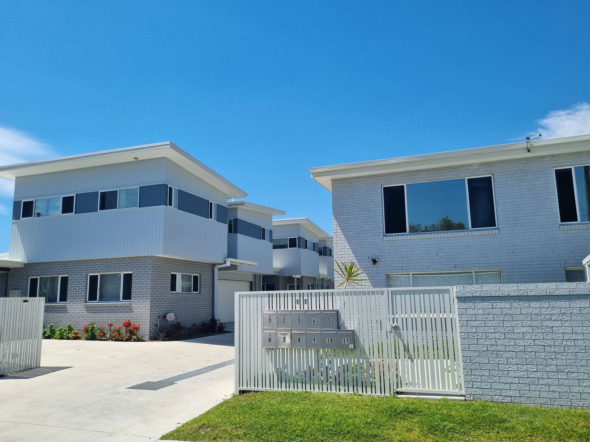 Gray and White Two-story Apartment Buildings With a White Fence — Acheson Building Certification in Nambucca Heads, NSW