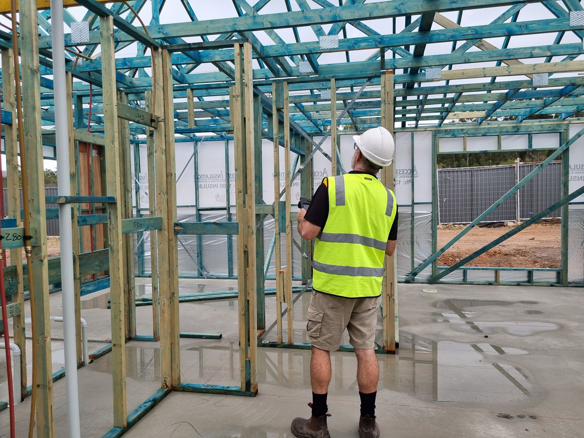 Construction Worker in a Safety Vest and Hard Hat — Acheson Building Certification in Nambucca Heads, NSW