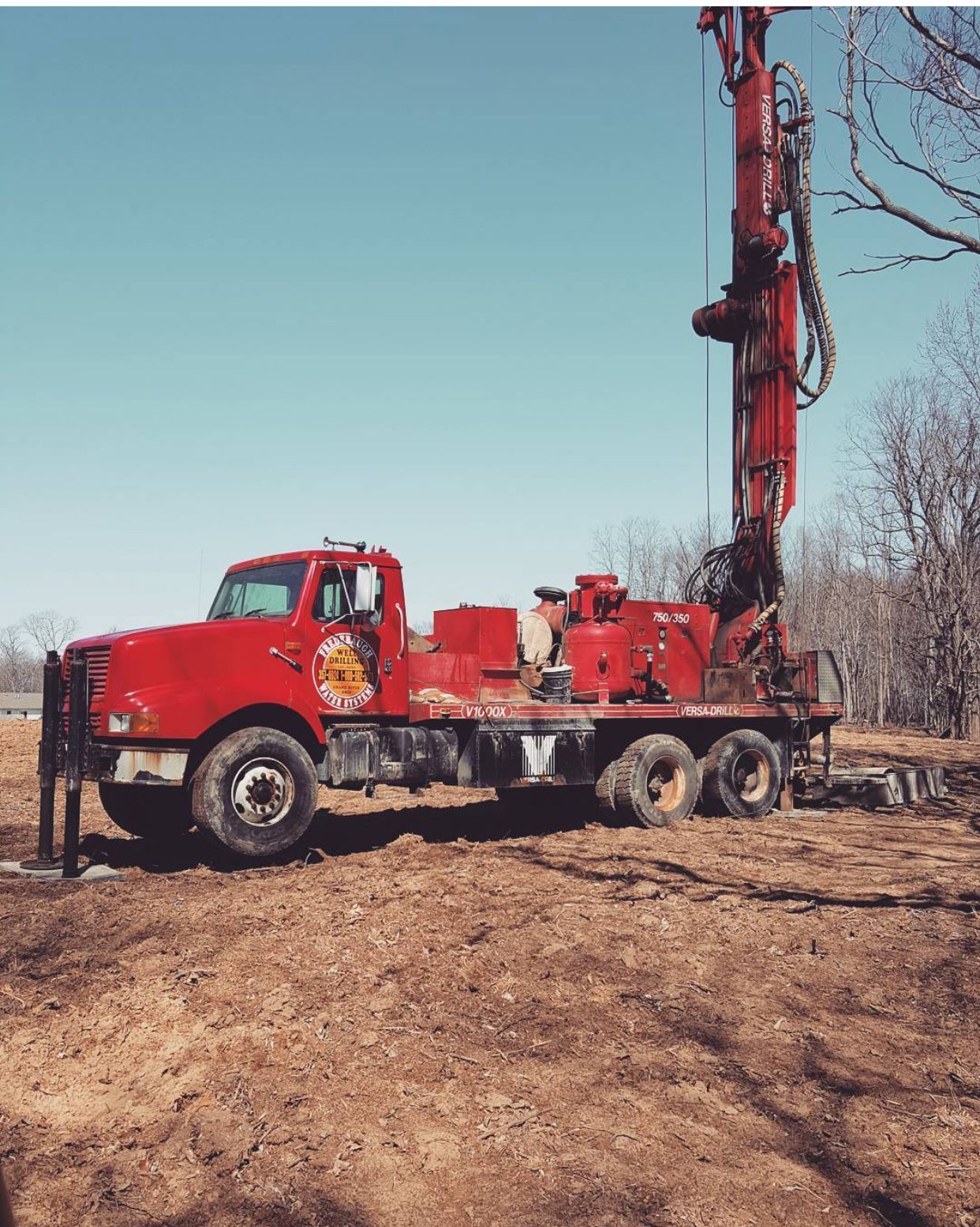 A machine is drilling a hole in the ground