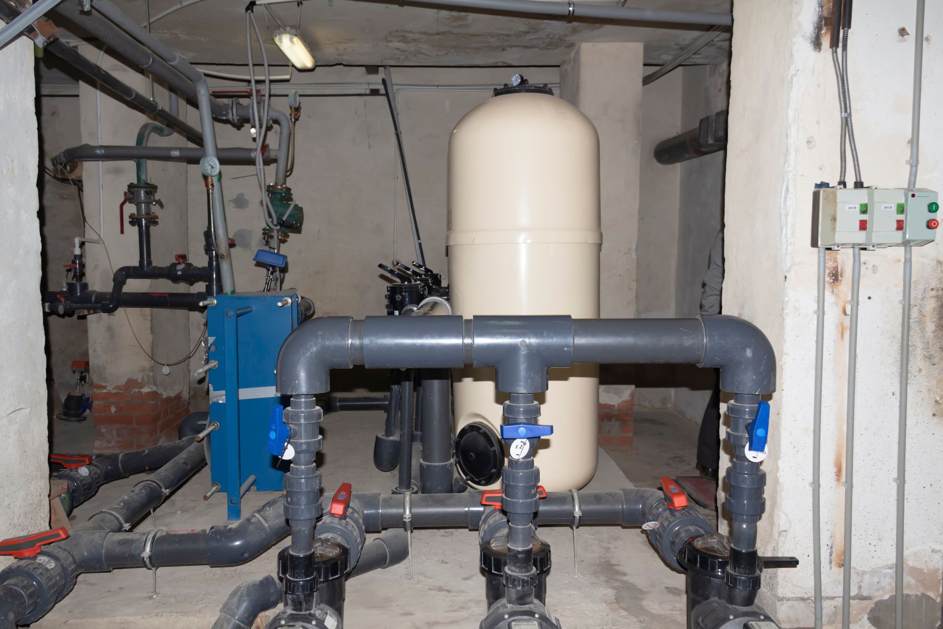 A room filled with lots of pipes and valves