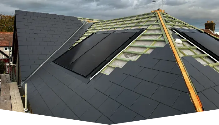 A roof with a lot of solar panels on it