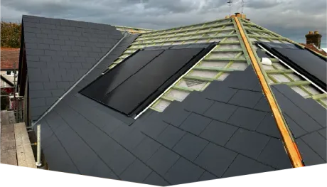 A roof with a lot of solar panels on it
