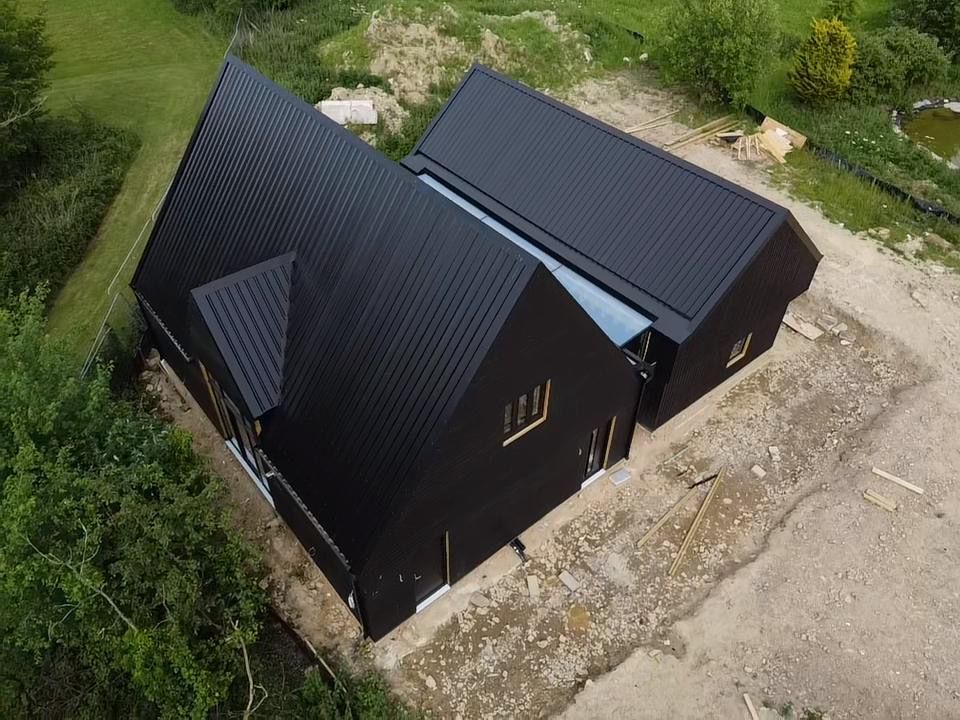 Black industrial roof cladding and metal sheeting