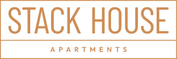 The logo for stack house apartments is brown and white.