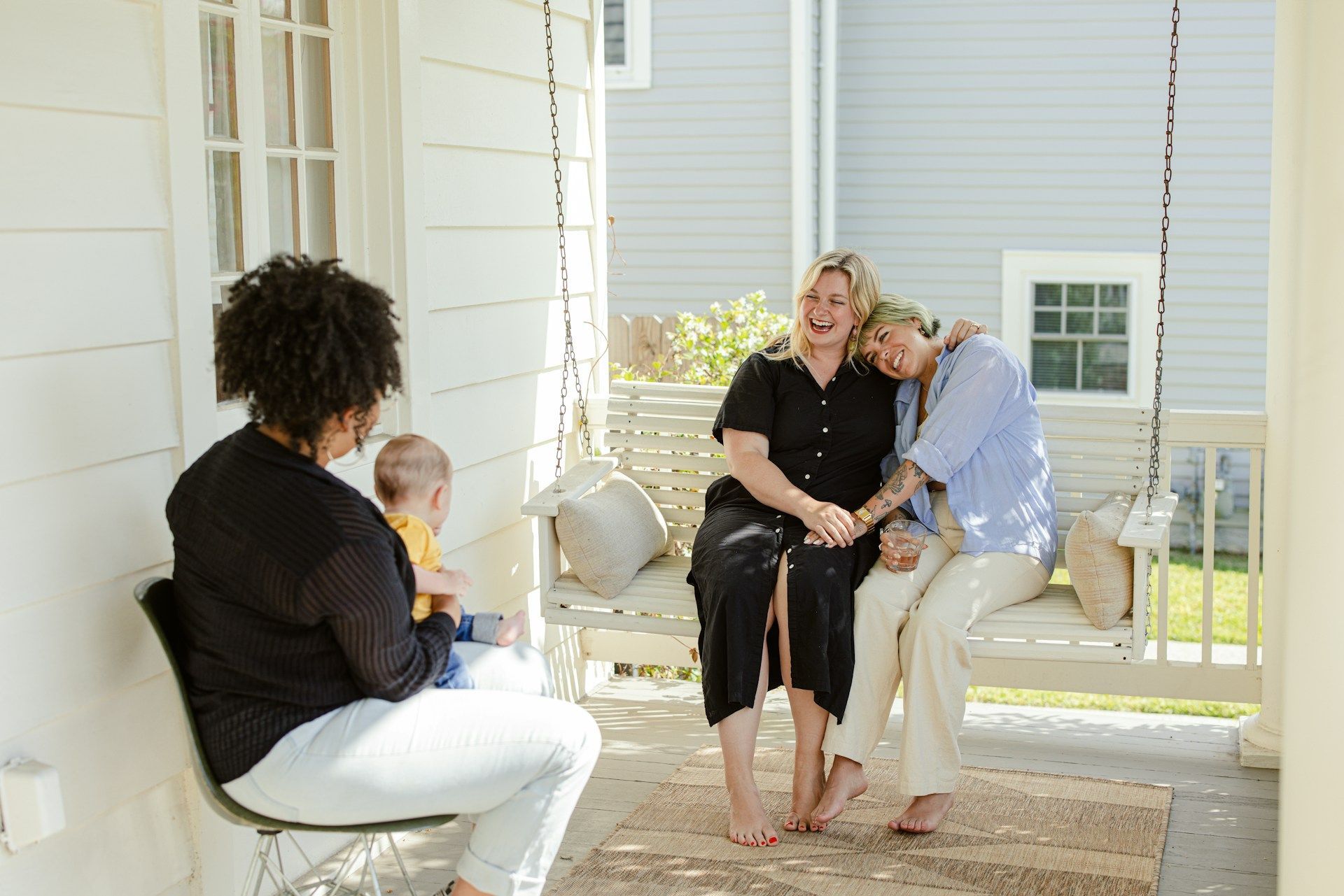 Two beagle dogs are sitting in the back of a vehicle.