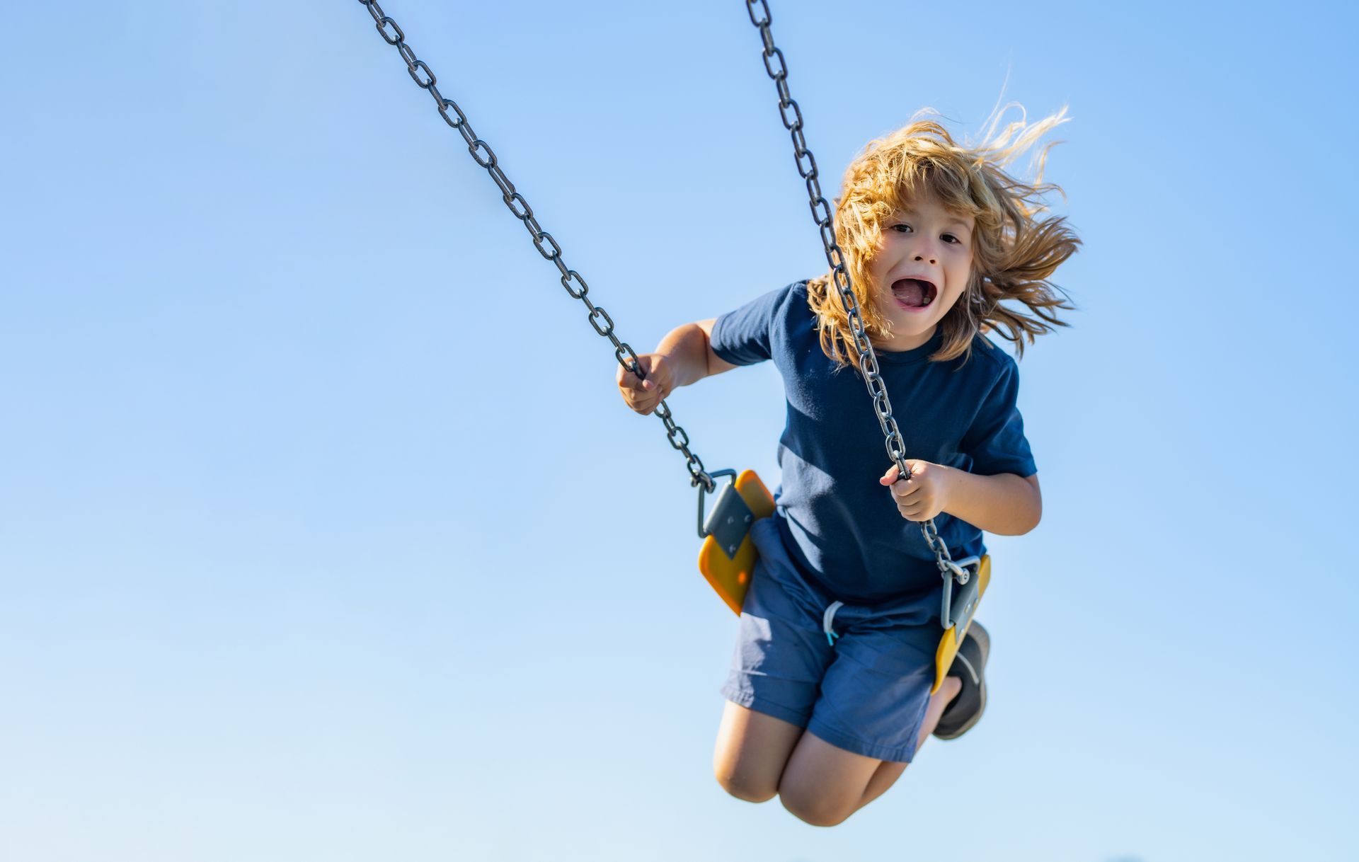 kid on a swing