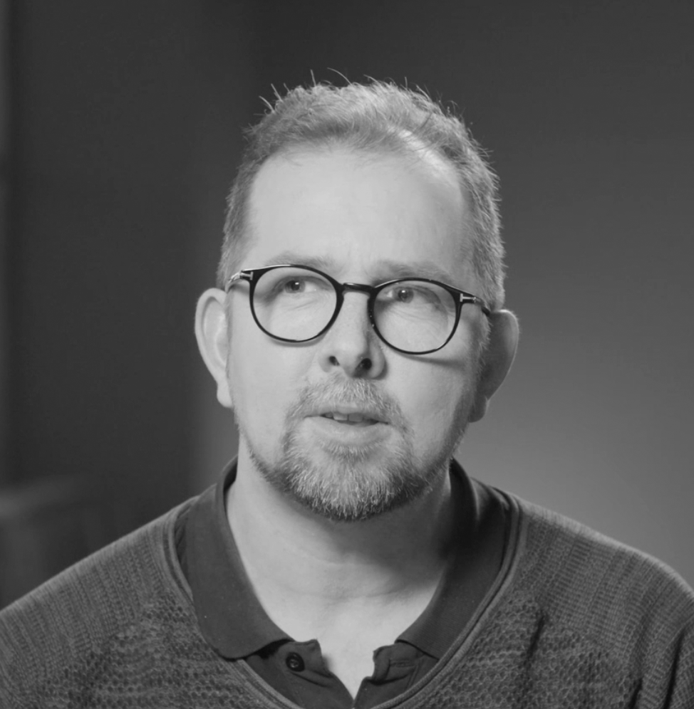 Black and white headshot of Henrik Kniberg