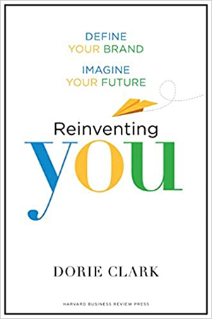 A book titled reinventing you by dorie clark