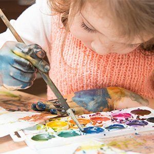 little girl painting