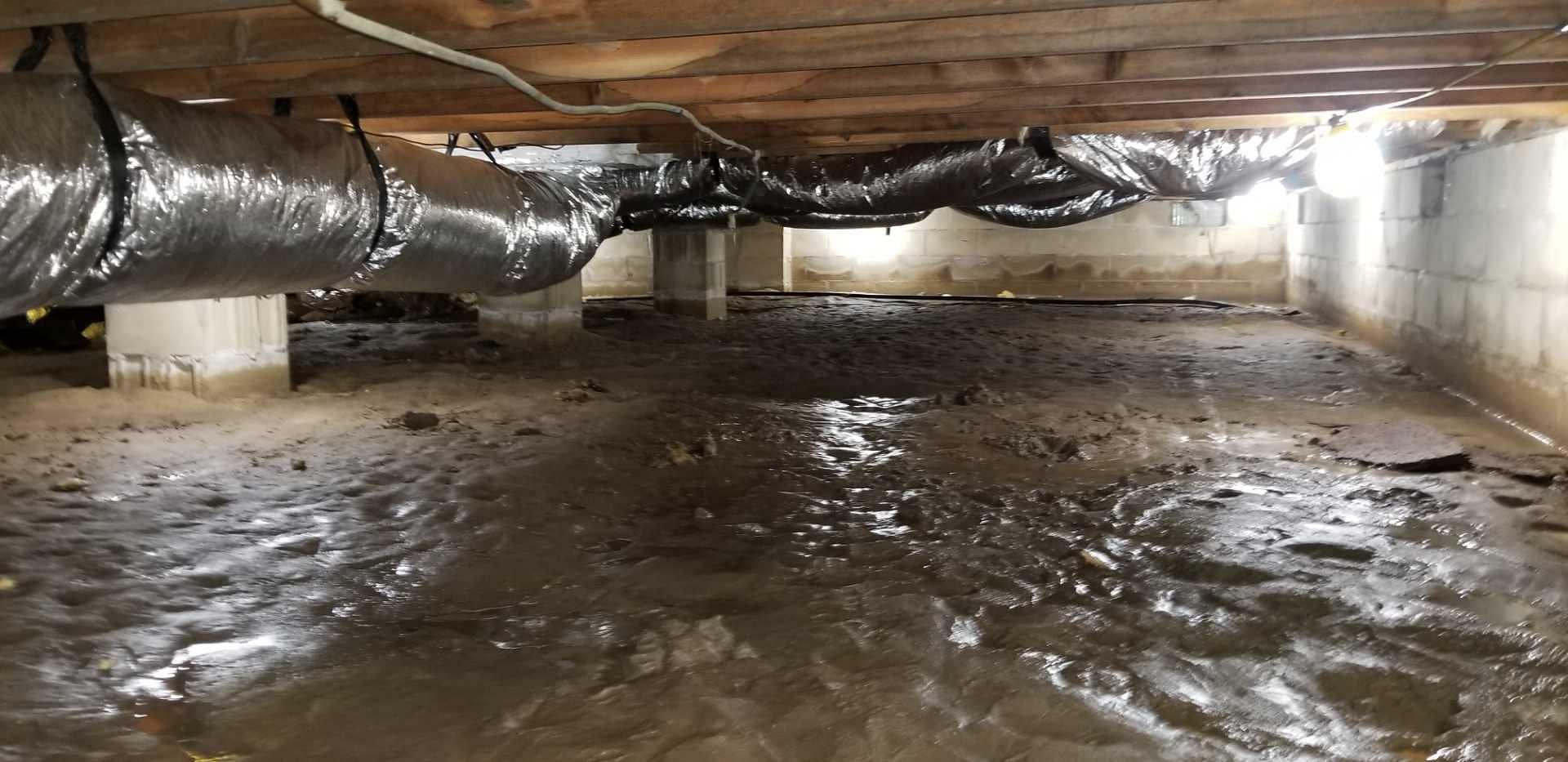 A flooded crawl space under a home