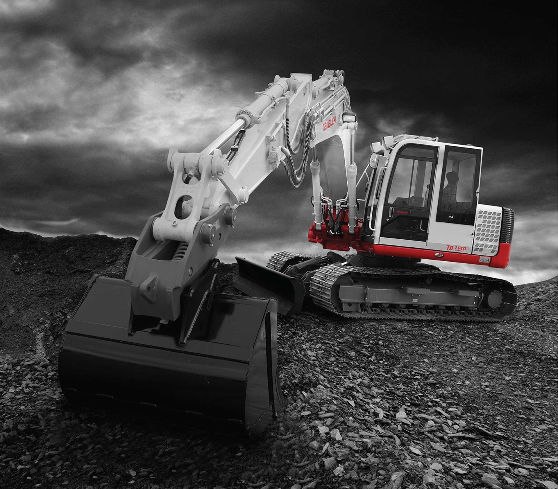 Excavator with red and white accents on a rocky surface, monochrome background.