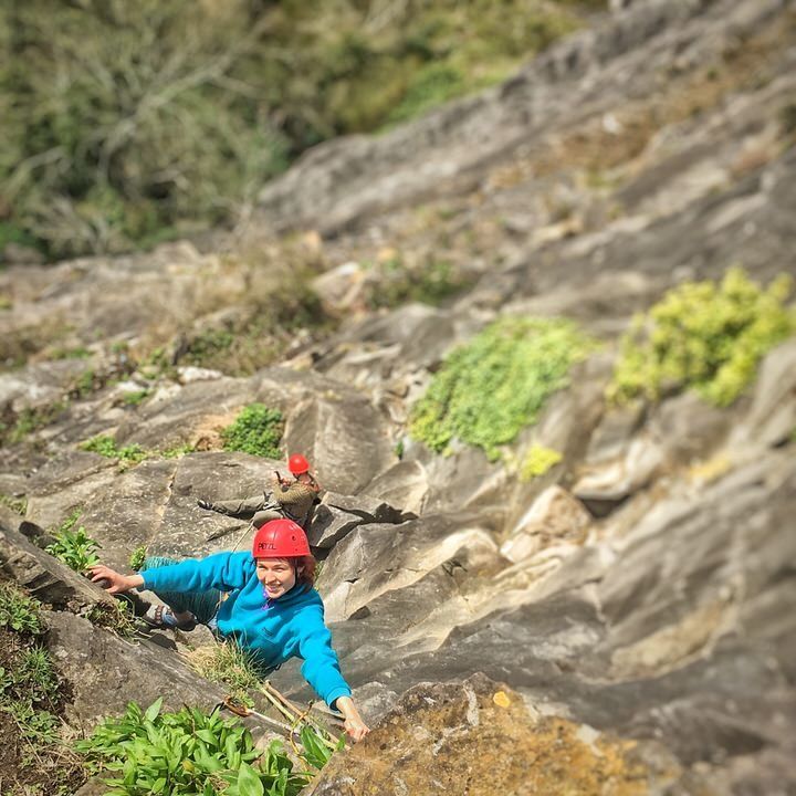 Climber with Red Helmet climbing Avon gorge