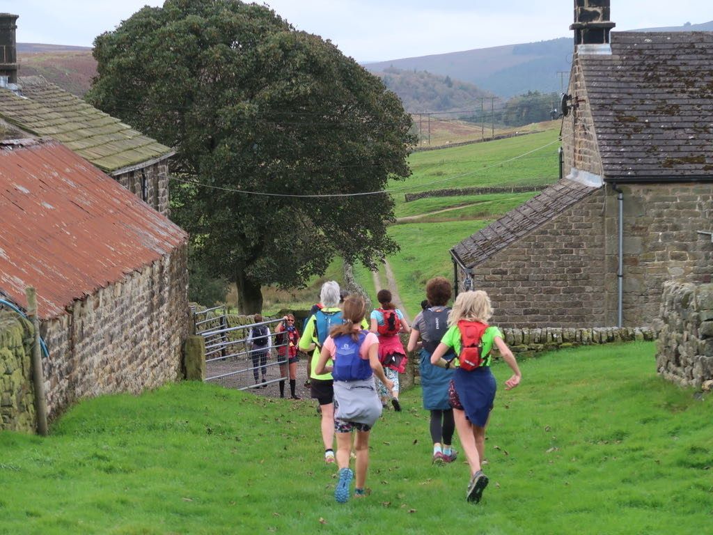 Walker sitting on the edge of a cliff