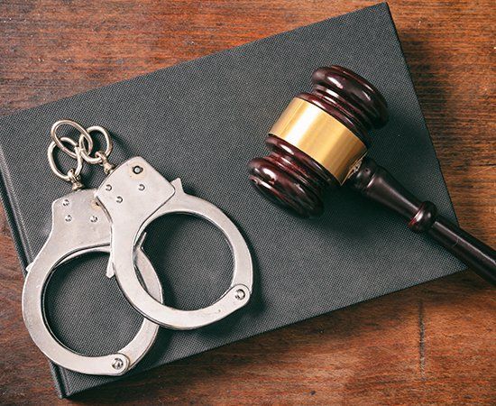 Handcuffs, Gavel On Book — Decatur, TX — Law Offices of Steven Williams