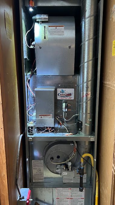 The inside of a heating and cooling system is shown.