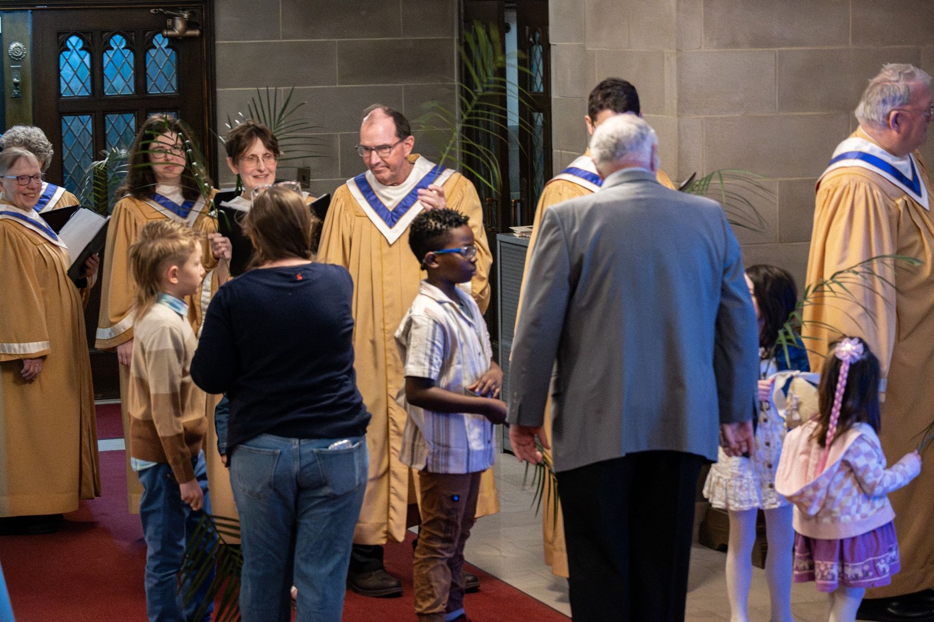 kids with palms in service