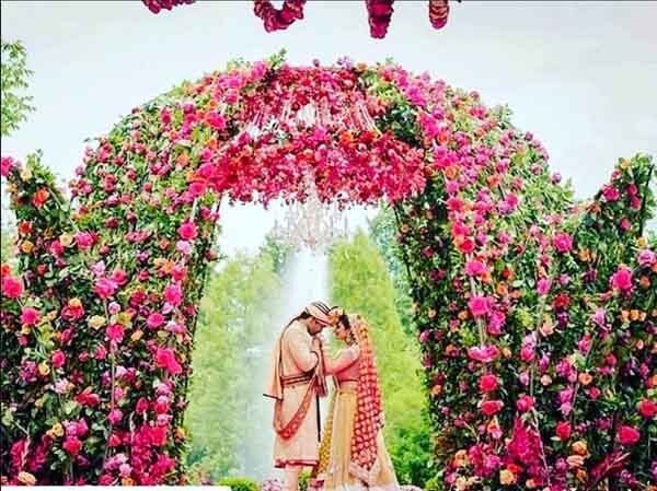 Couple under a flower dome
