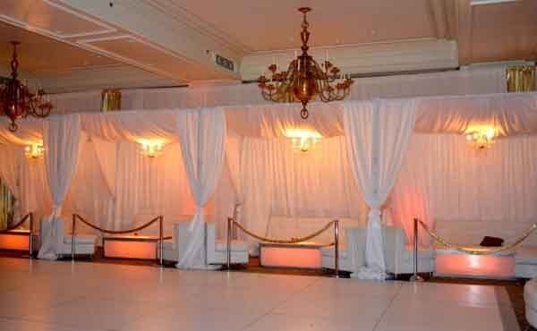 white drapes by couch