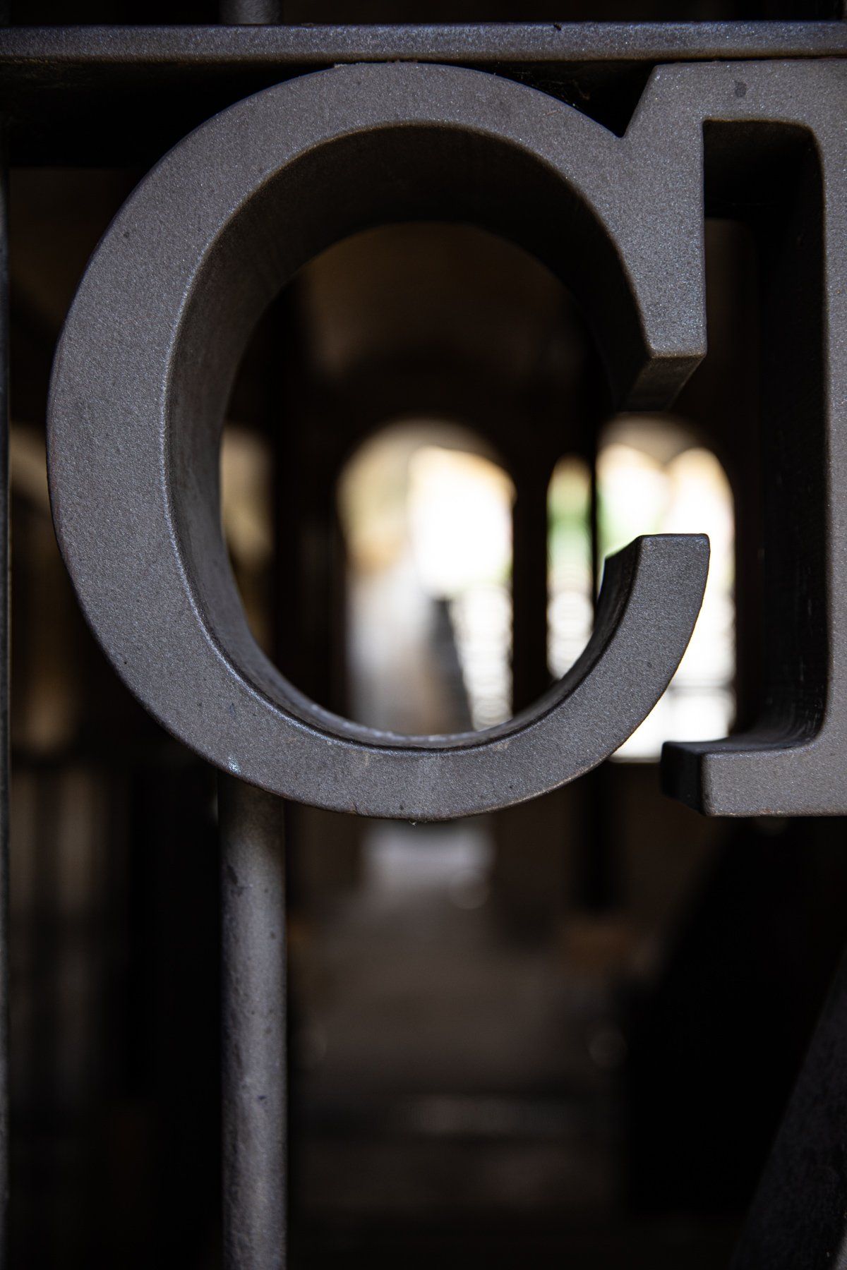 Letter C on Metal Fence — Book Editor in Australia