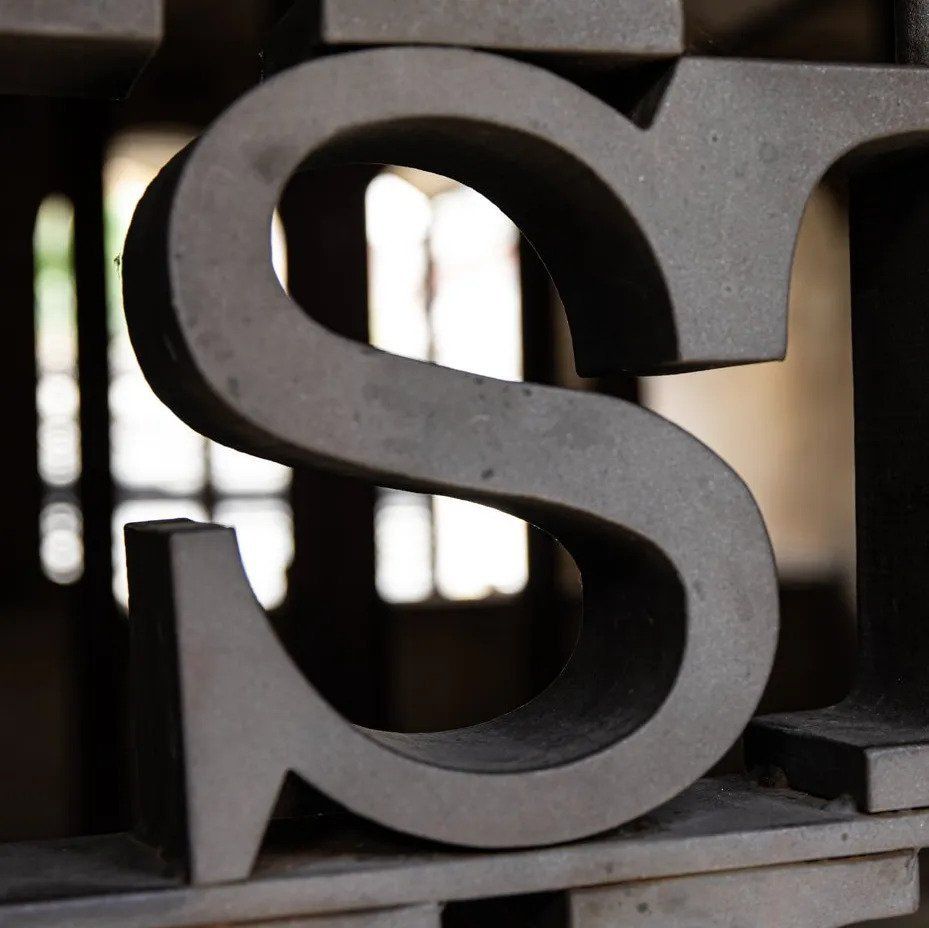 Lettering on Metal Fence — Book Editor in Australia