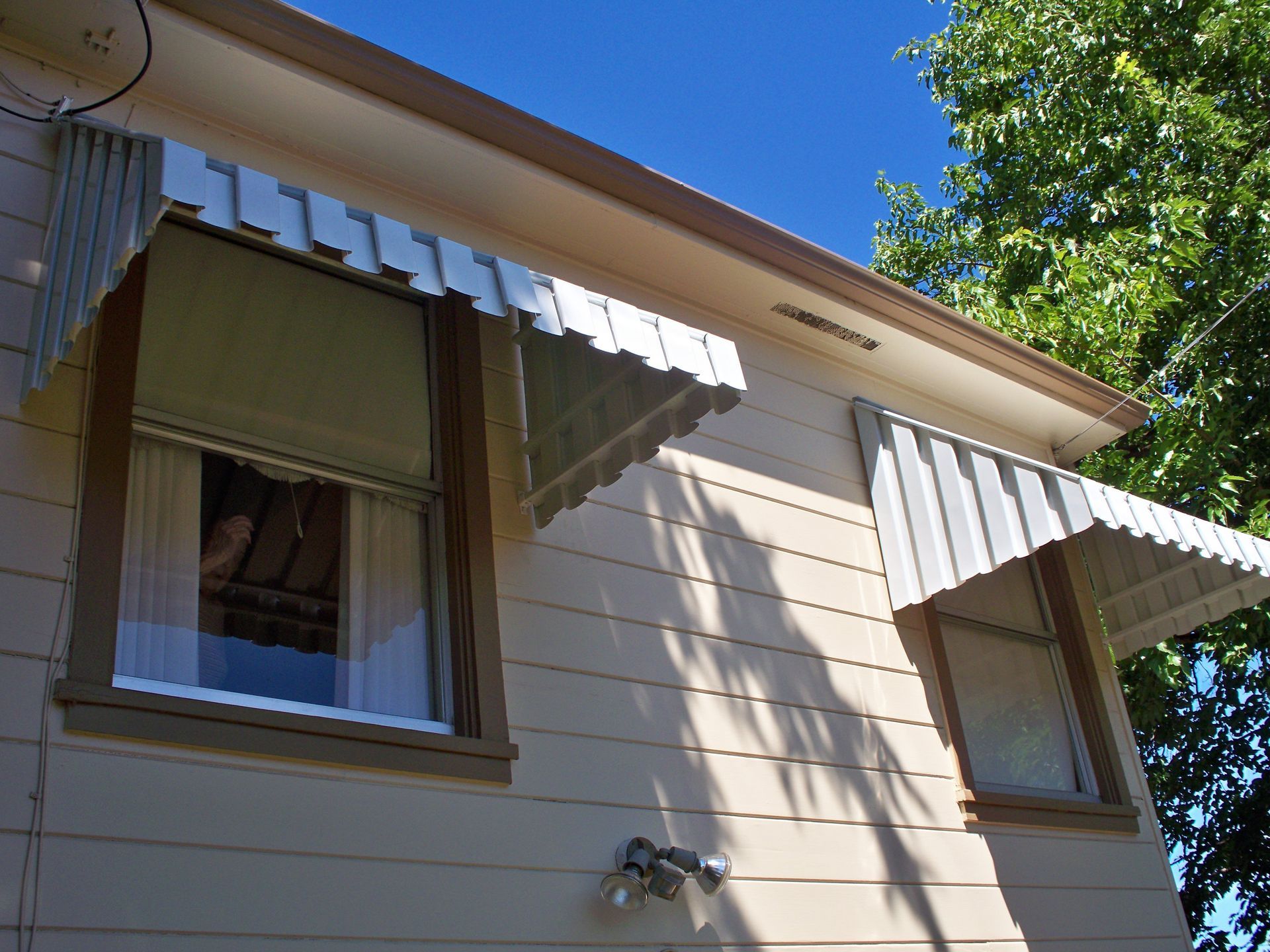 Window canopies on a house