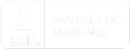 A white sign with the words `` accredited business '' written on it.