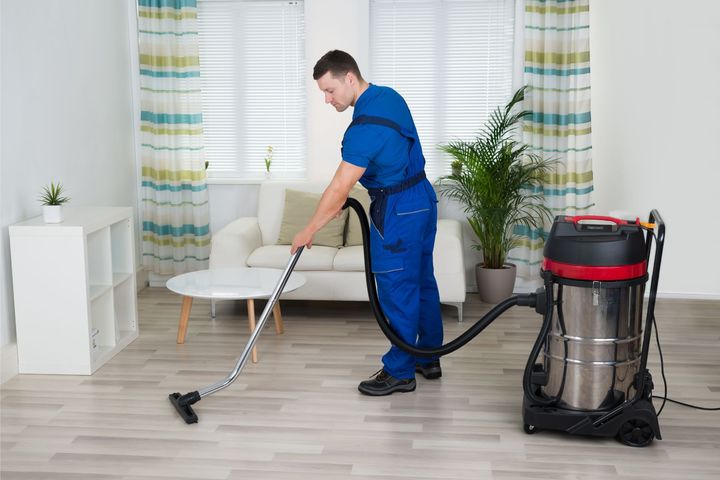 Janitor Using Vacuum — Anchorage, AK — A Affordable Cleaning By Diane's Service