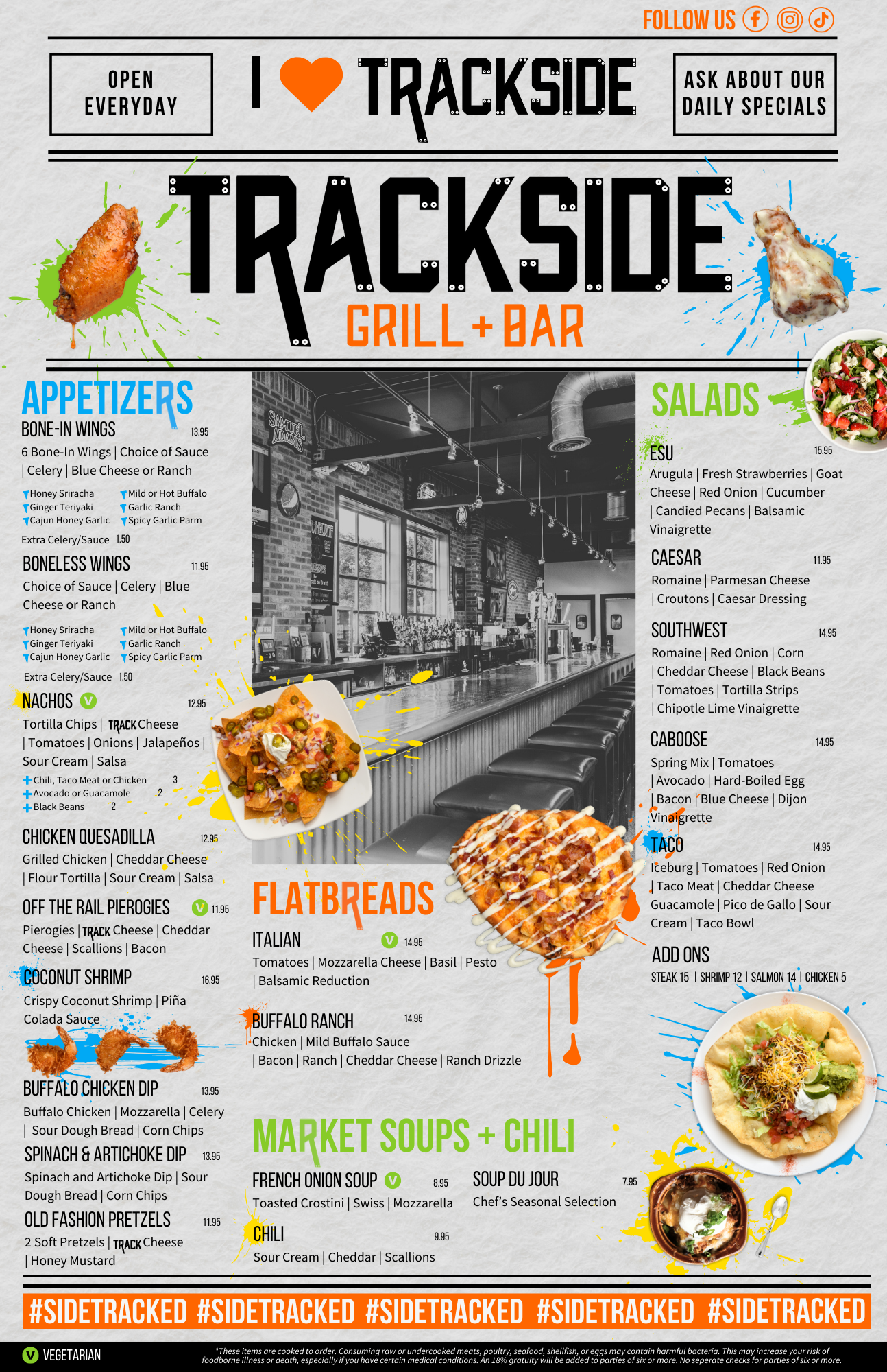 A menu for a restaurant called trackside grill and bar.