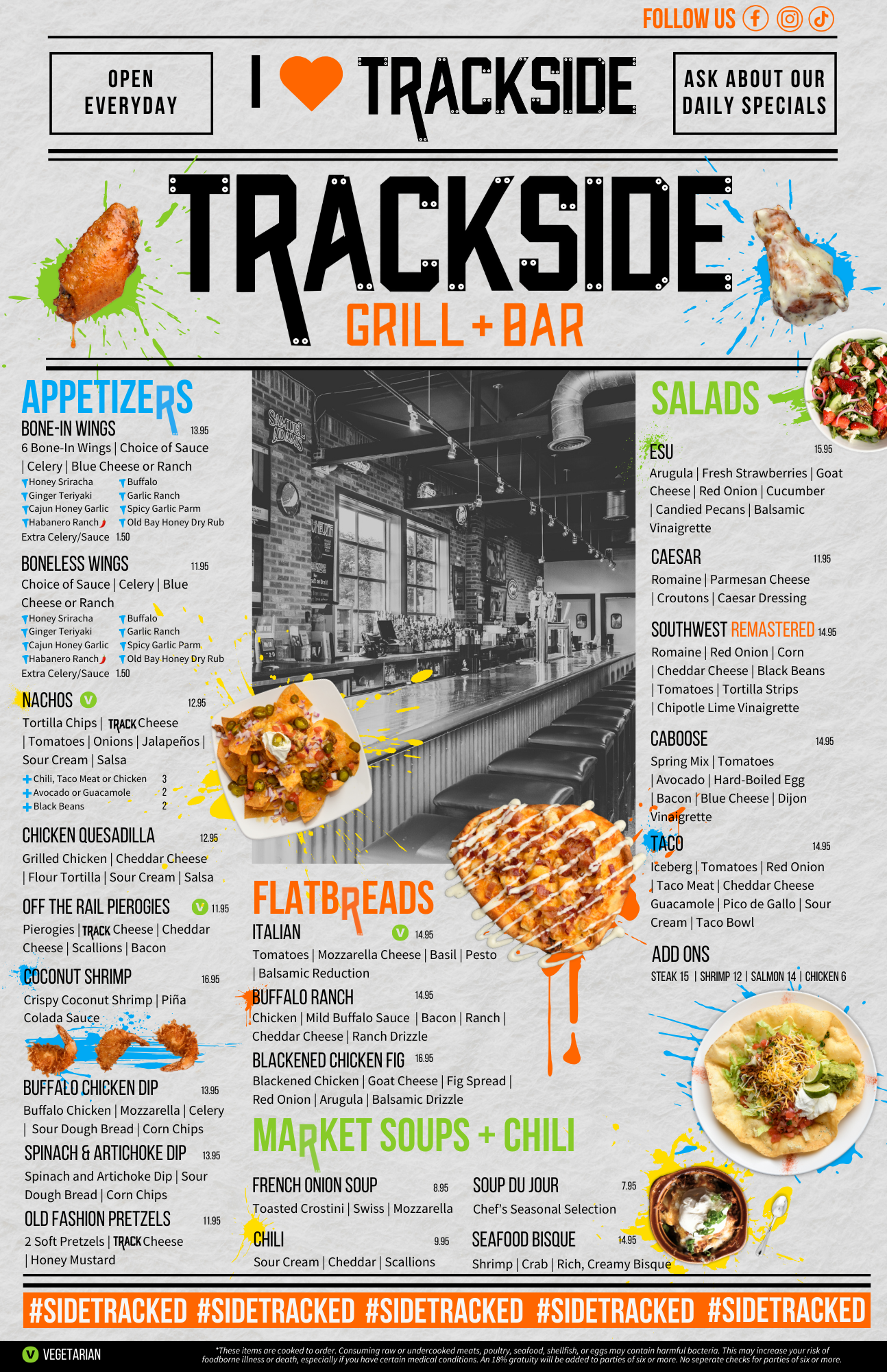 A menu for a restaurant called trackside grill and bar.