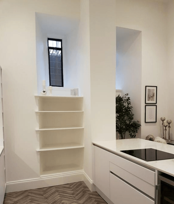 Picture of a contemporary kitchen in white by painters and decorators London