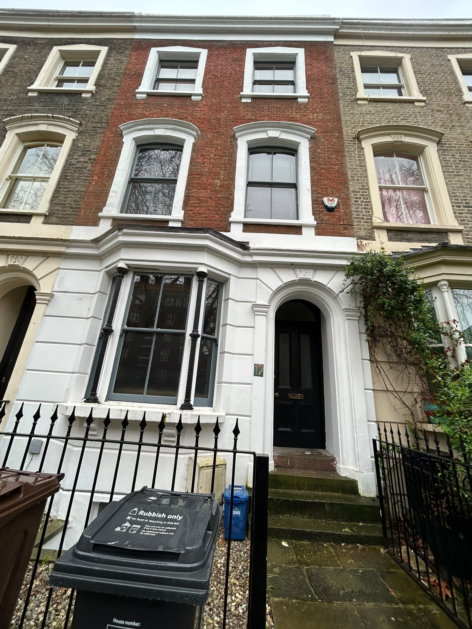 A picture of the front of a London terraced townhouse