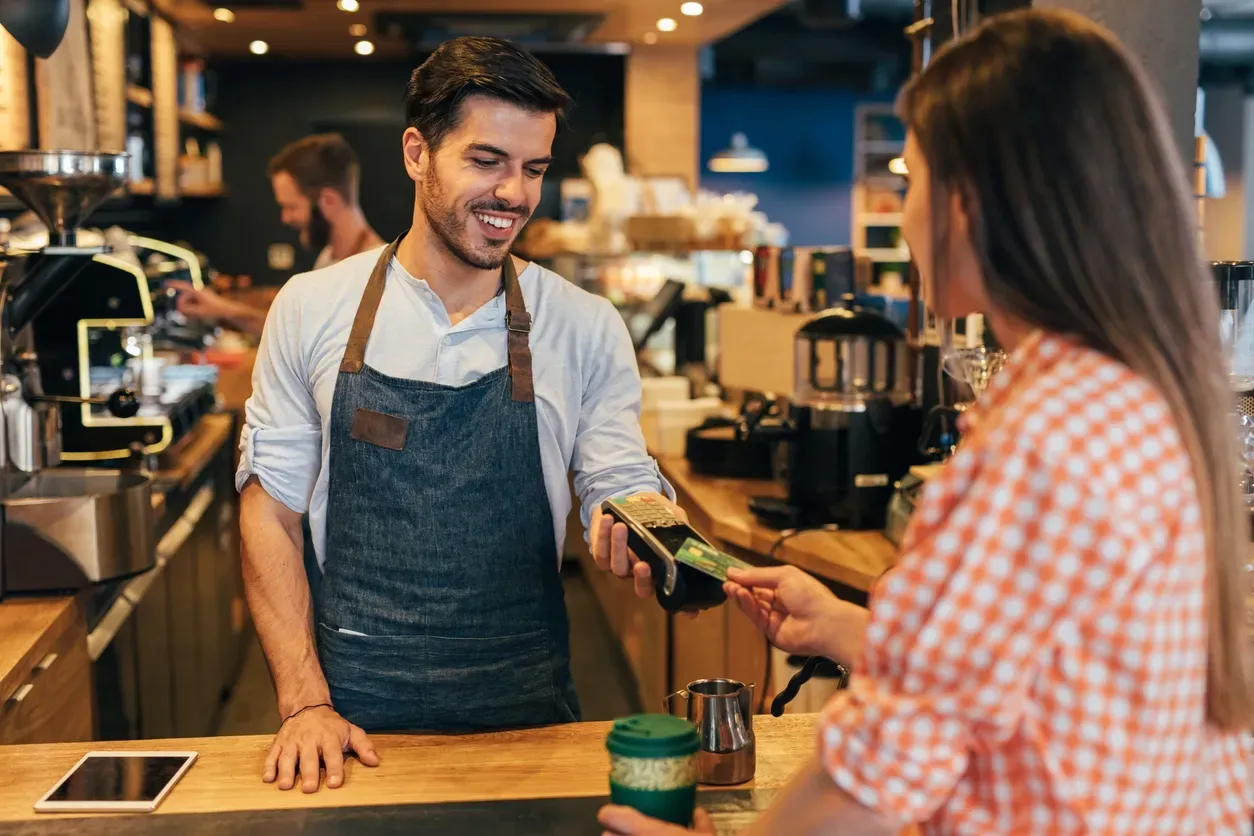 Barista using payment system