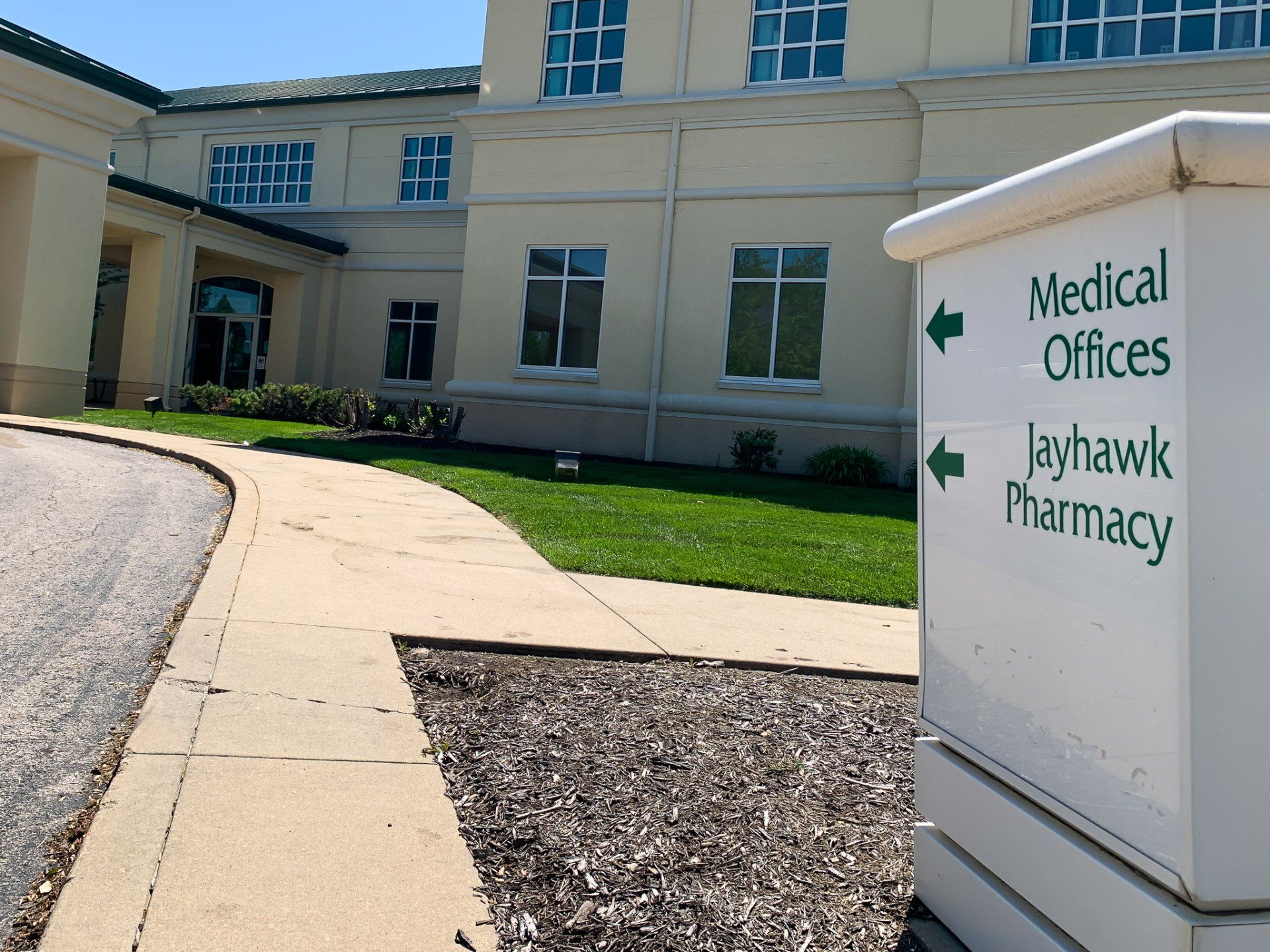 A sign for medical offices and jayhawk pharmacy