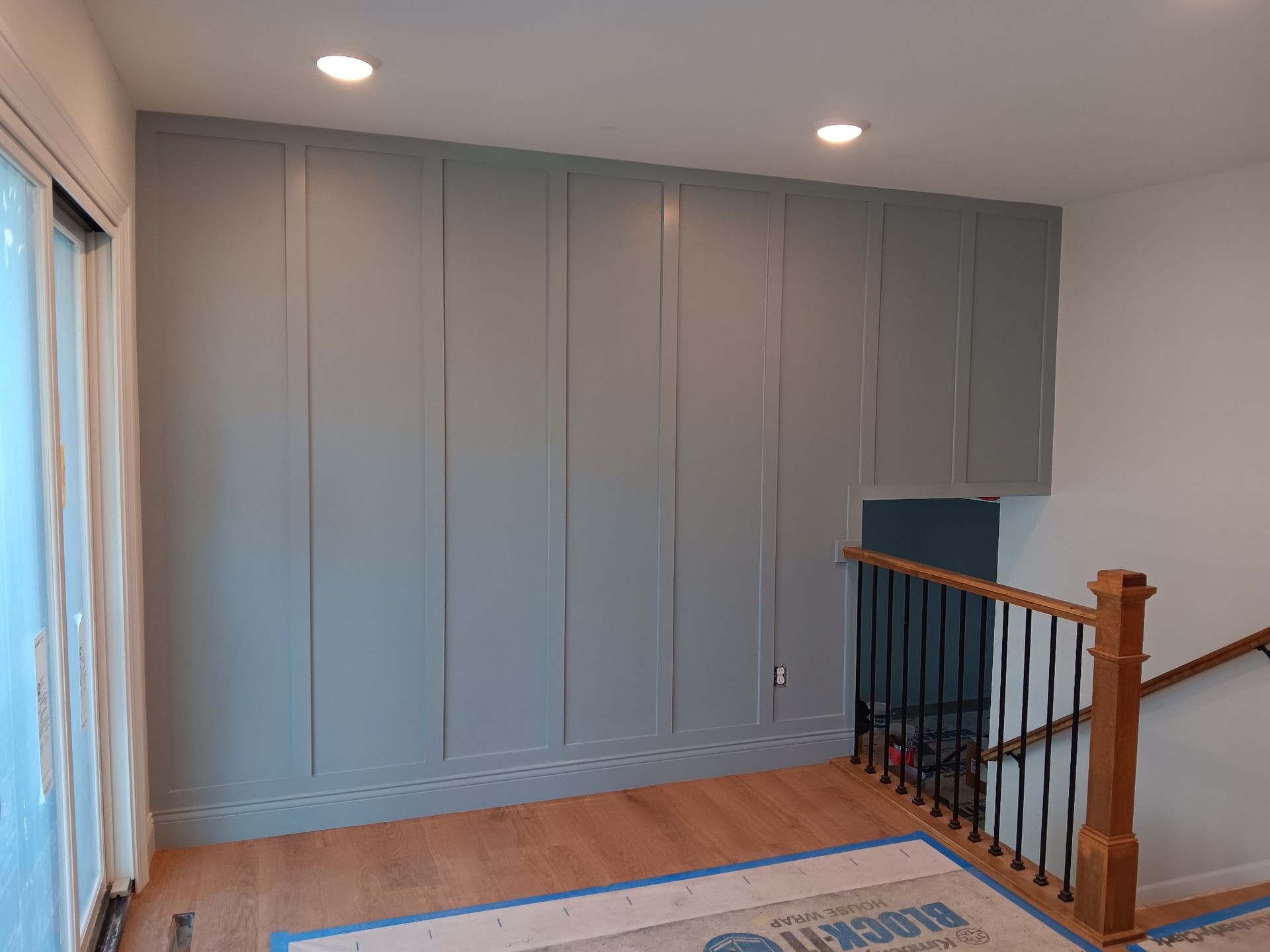 Room with a Staircase and a Sliding Glass Door — St Cloud, MN — Fine Line Paint LLC