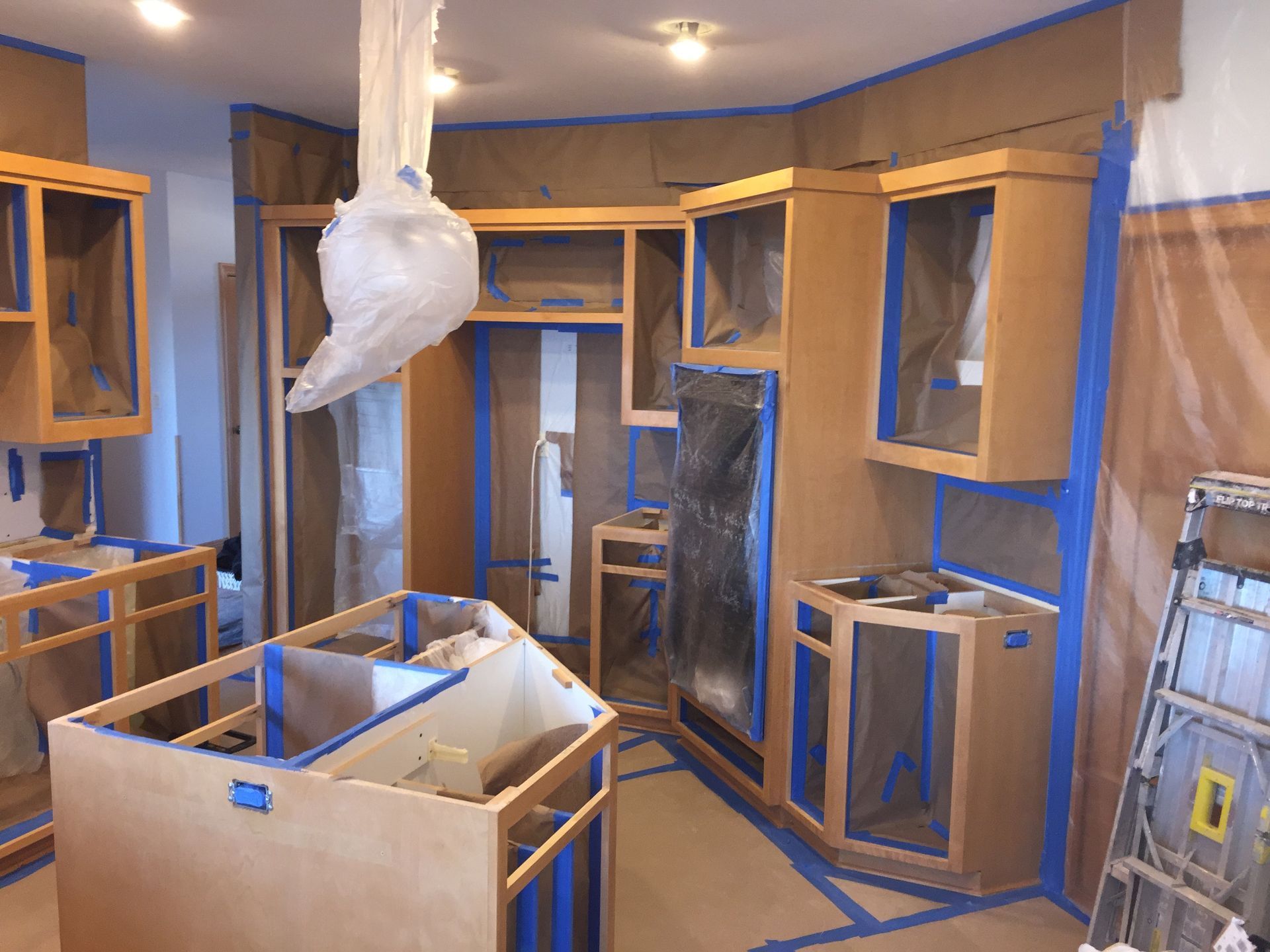 Kitchen with Blue Tape — St Cloud, MN — Fine Line Paint LLC