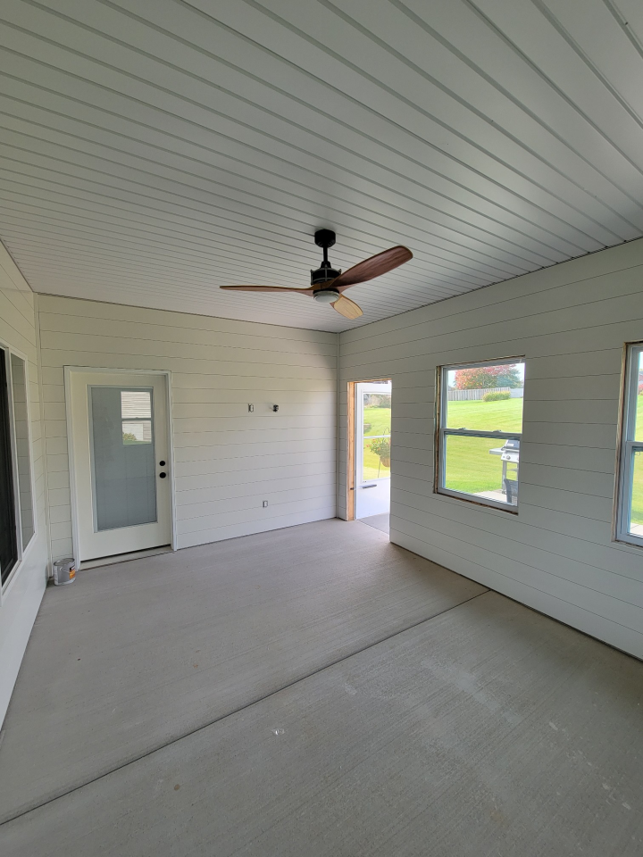 Empty Room with a Ceiling Fan and Windows — St Cloud, MN — Fine Line Paint LLC