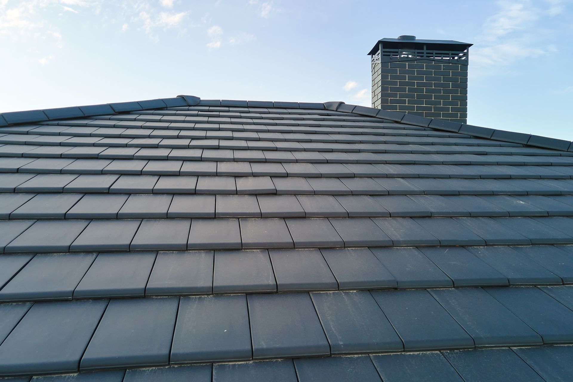 A roof with a chimney on top of it