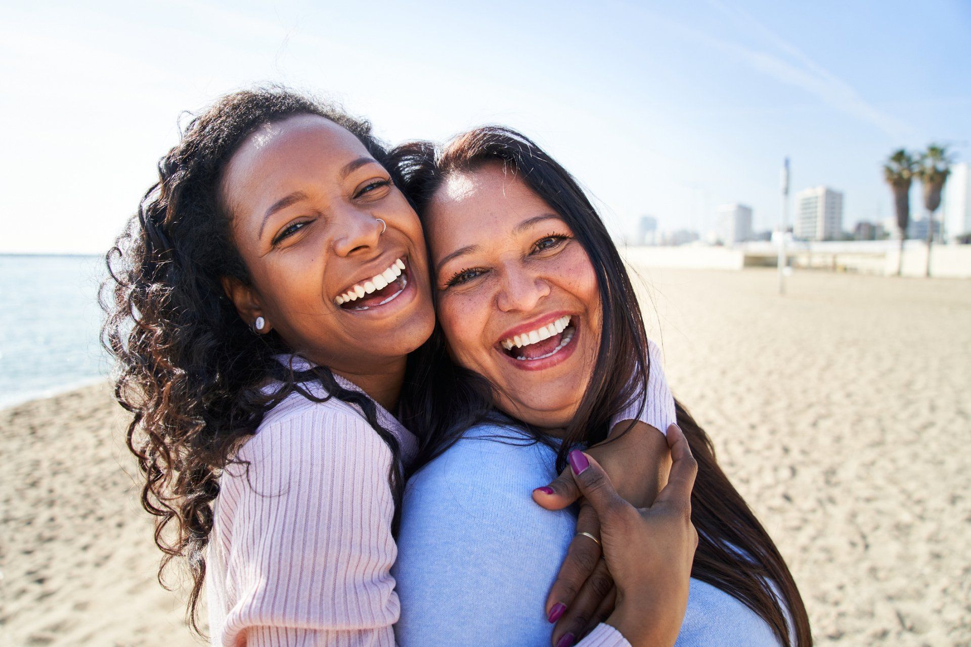Mother And Daughter At The Beach Smiling — Nashville, TN — Scott Nickels, DDS