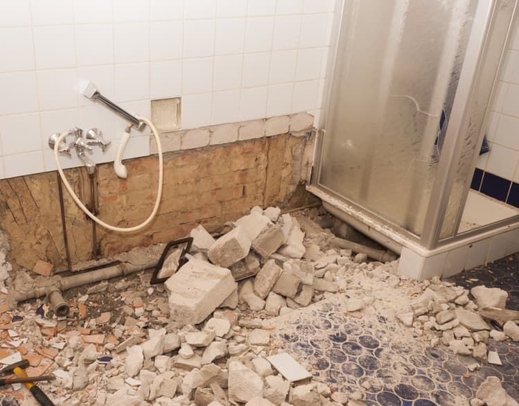 A Bathroom is Being Remodelled and a Shower Stall is Being Removed — HJK Plastering In Mullumbimby, NSW