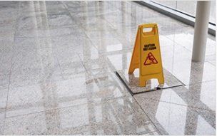 Wet Floor Sign on Lobby - Cleaning in Medford and Grants Pass, OL